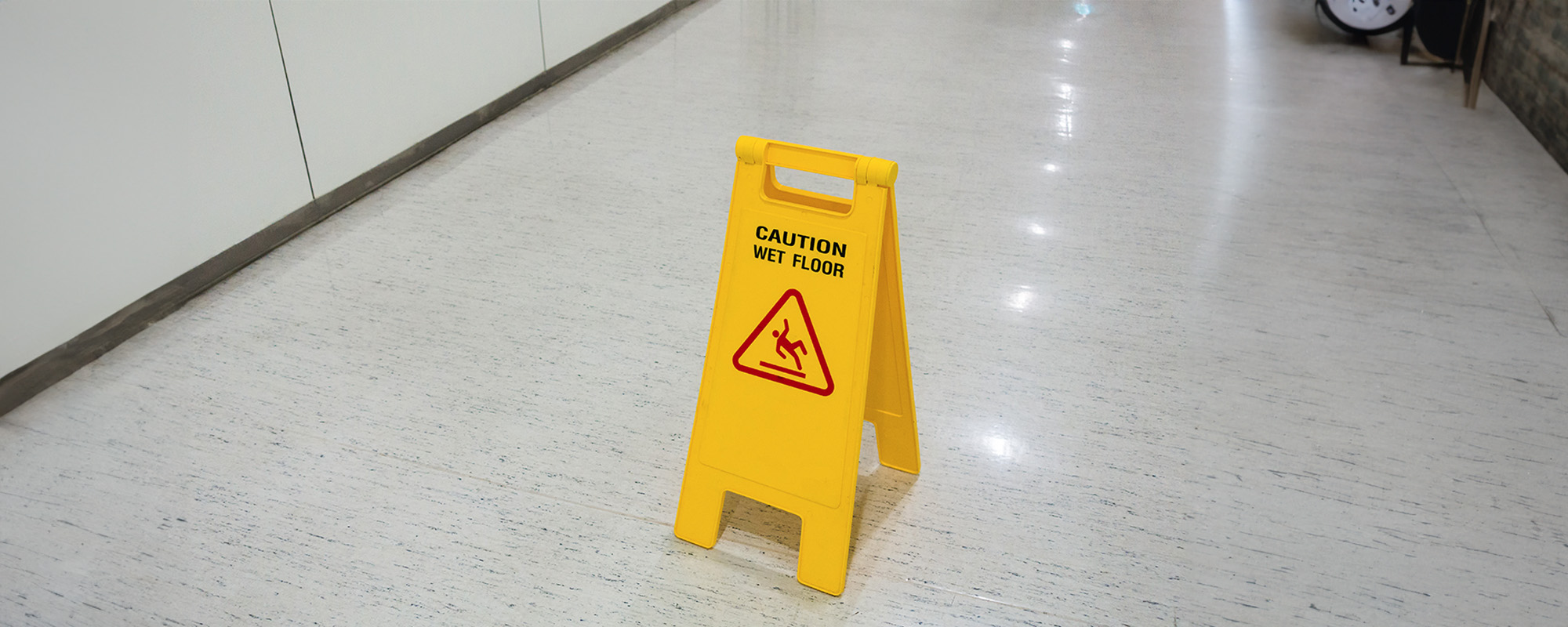 signs plastic yellow put on floor text caution wet floor