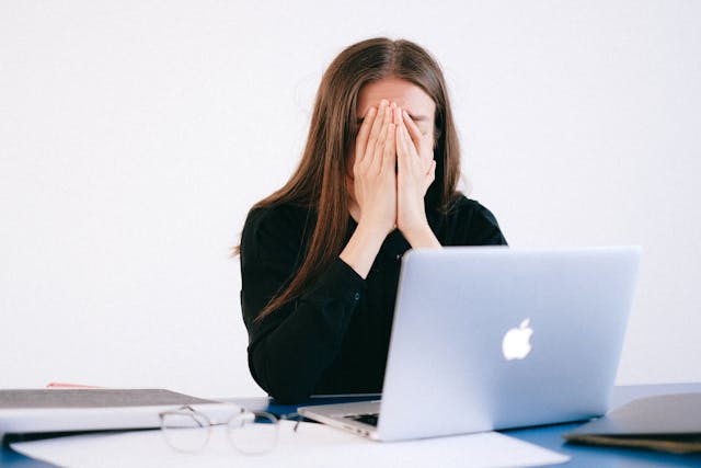 stressed woman with laptop