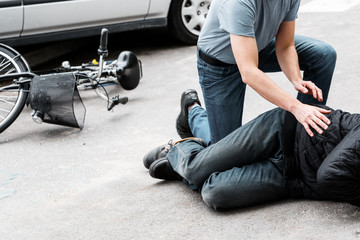 bike accident person on ground