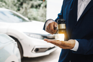 man with gavel in front of cars