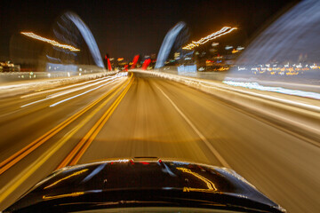 POV from car with lights and road blurring