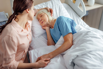 family member in hospital bed