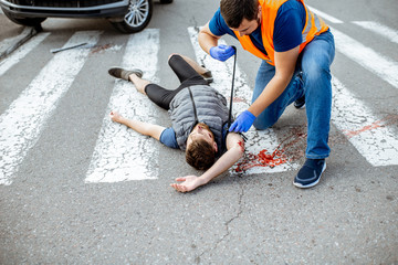pedestrian on ground bleeding
